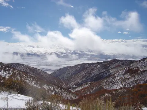 Snow-dusted mountains and valleys seen from the Cherry Ranch